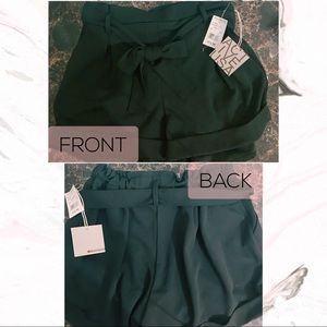 Black high waisted shorts with bow tie in front